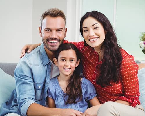 Happy Parents With Daughter in Their New Home in Colorado